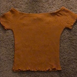 New, never worn. Off the shoulder top.